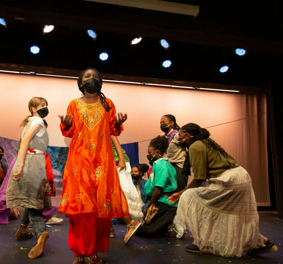 Children of Eden cast on stage