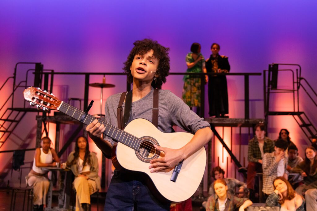 student from musical theatre program for teens performing Hadestown